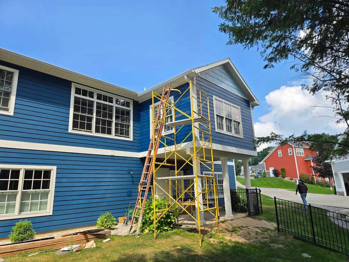 Exterior framing and siding installation for sunroom additions Michigan