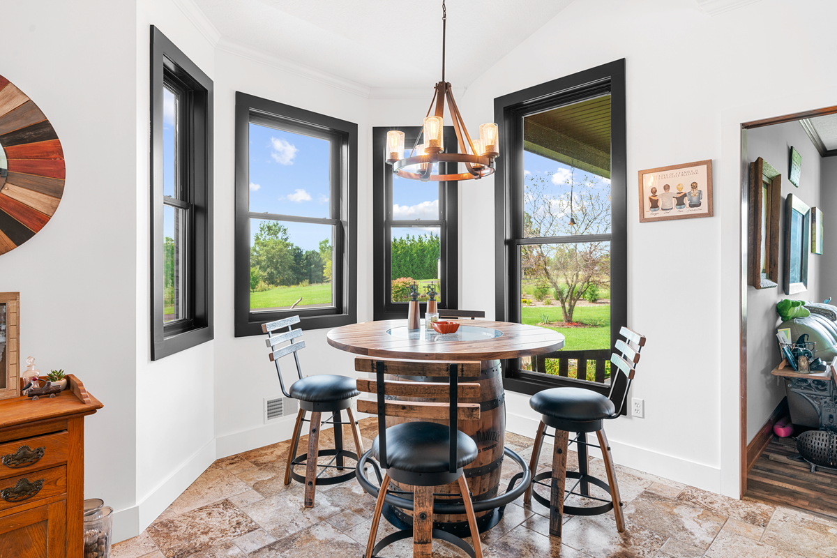 after-black-replacement-windows-dining-room-holt-mi.webp