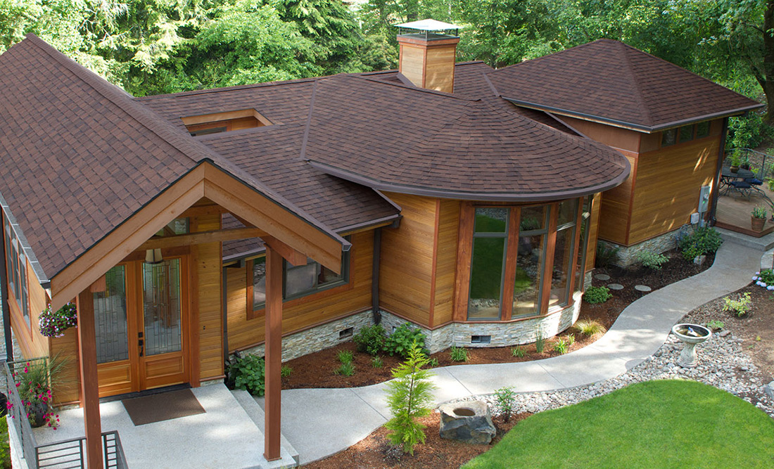 Classic Malarkey Roof Complements Wood & Aluminum Siding on Mason, Michigan Home