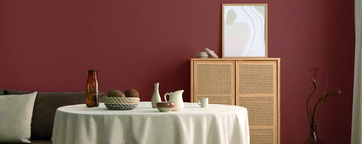 Modern kitchen showcasing 2026 color trends with green cabinets and quartz countertops in a Michigan home remodel