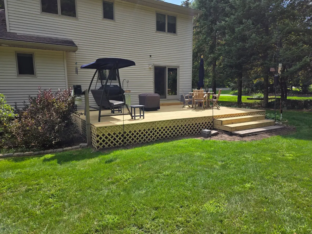 Expansive custom wood deck built by expert general contractors in Traverse City.