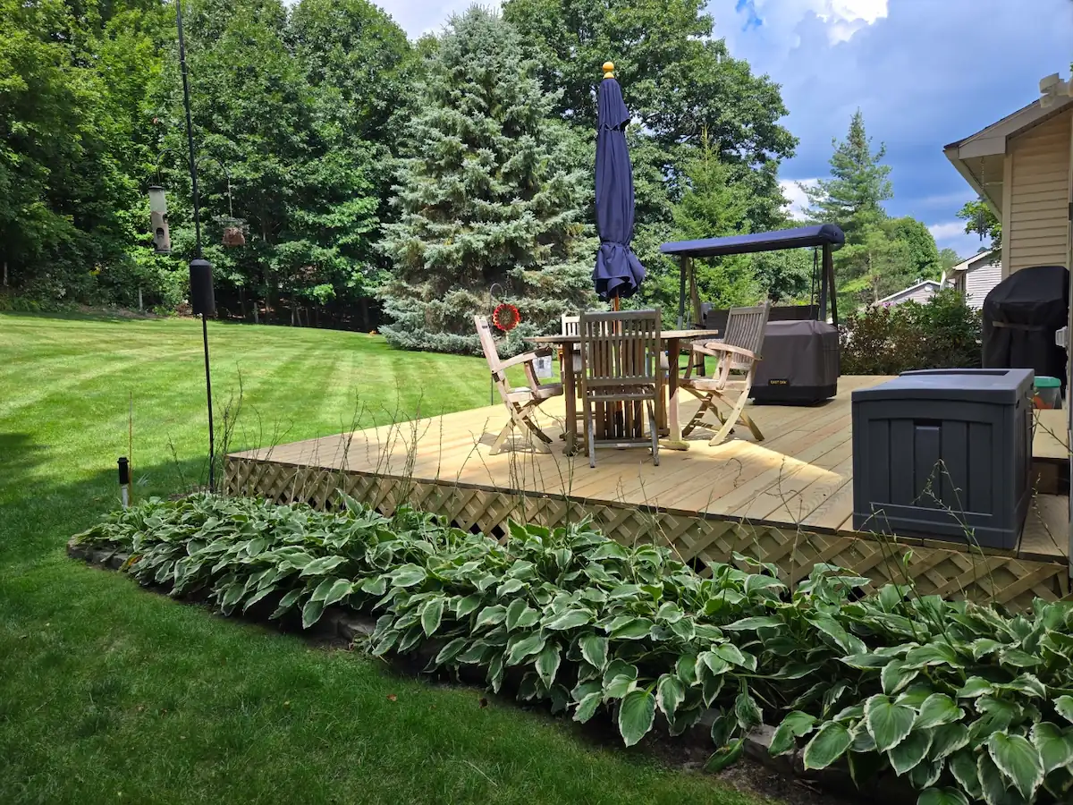 Treated wood deck installation in Traverse City by top Michigan remodeling contractors.