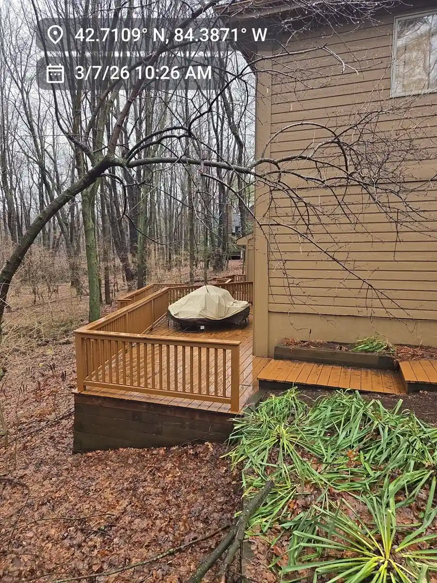 Old, rotting wood deck in Okemos needing repair from local home improvement contractors.