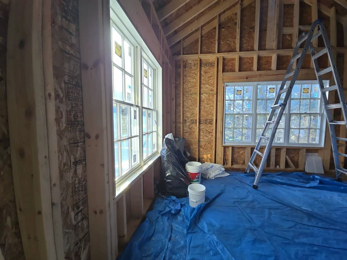 Interior framing of a new addition by leading home addition contractors Michigan