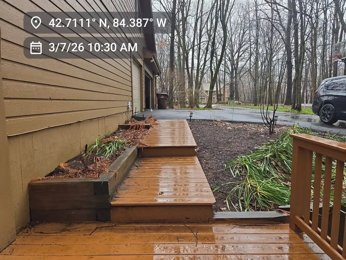 Outdated wood deck stairs in Okemos evaluated by our professional general contractors.