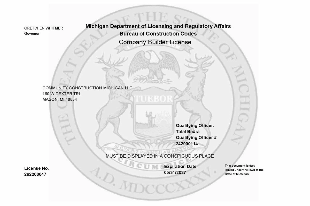 Official Michigan Department of Licensing and Regulatory Affairs company builder license document for Community Construction Michigan LLC, License No. 262200047, Qualifying Officer Talal Badra.