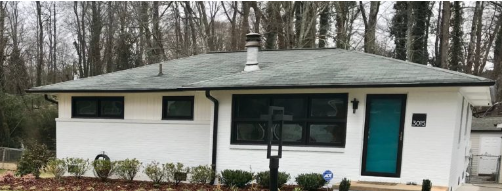 Grand Ledge Home Featuring Energy-Efficient Replacement Black Windows