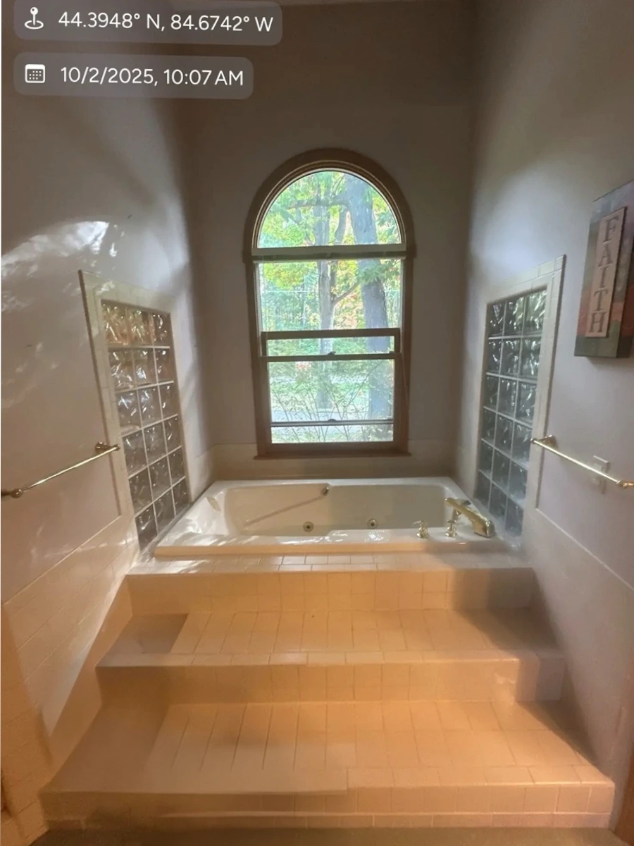 Removing large garden tub for bathroom remodel in Traverse City