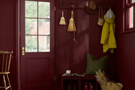 A deep red Divine Damson paint color by Graham & Brown