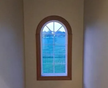 before-arched-staircase-window-replacement-holt-mi.webp